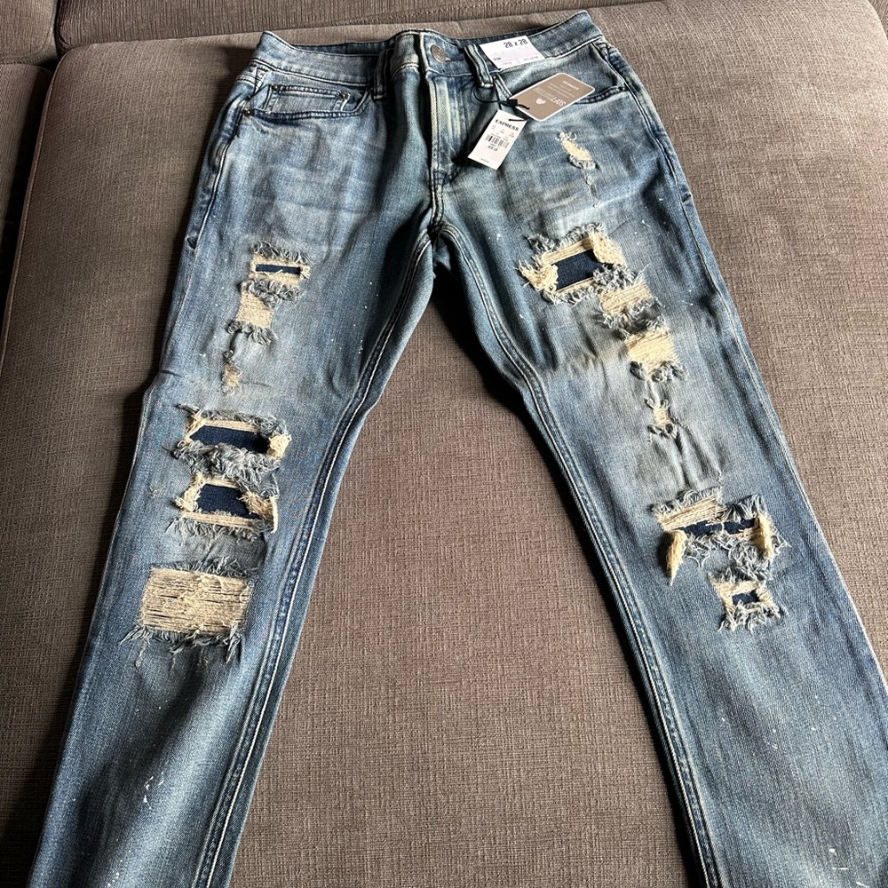 Distressed Blue Jeans